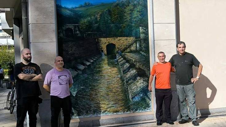 Kajueteik Salbideko labaderoa "berpiztu" du bere mural berriarekin