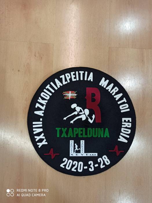 Azpeitia-Azkoitia lasterketaren txapelak, osasungintzako eta zahar etxeetako langileentzat